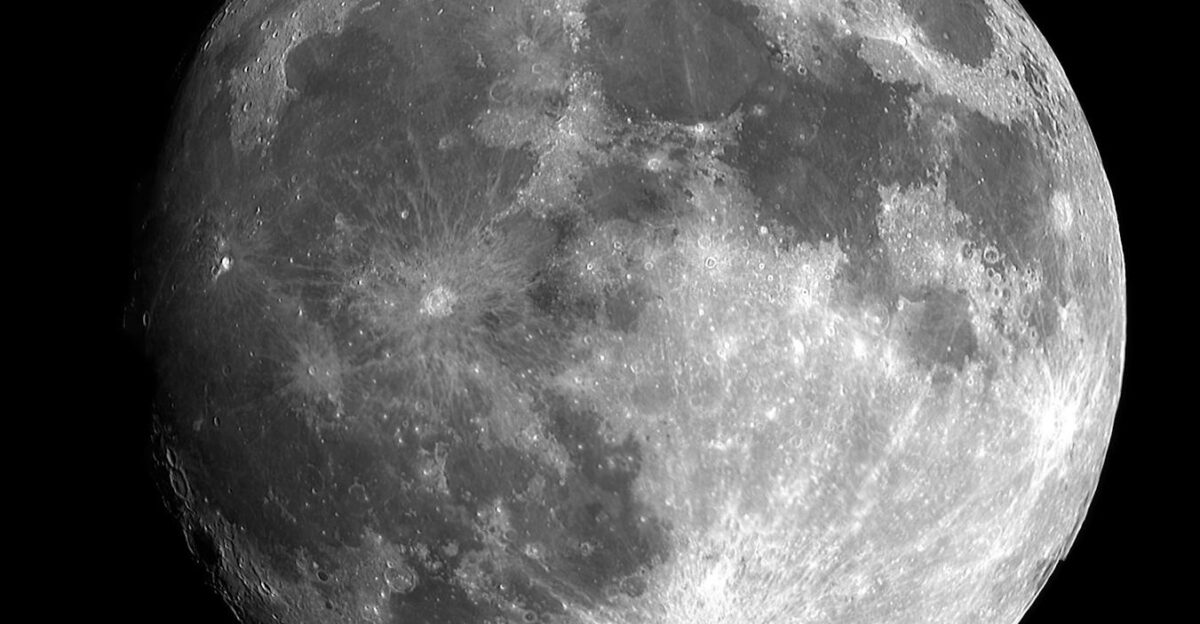 Captivating black and white image of the full moon showcasing intricate lunar details