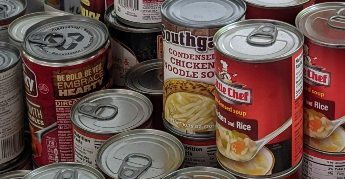 red and white labeled cans