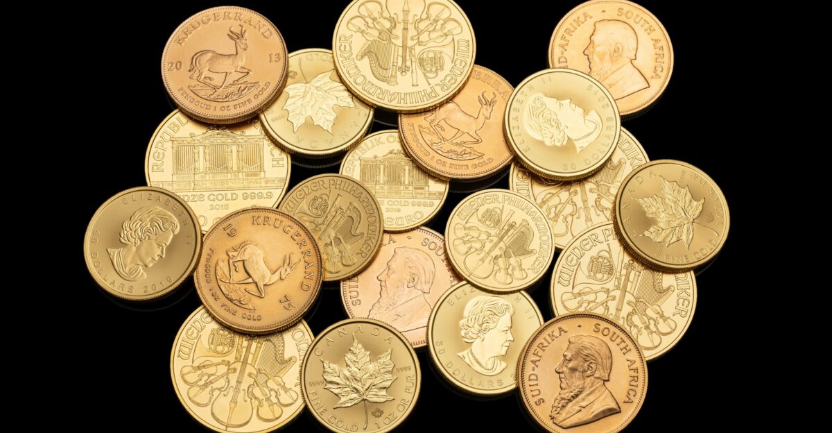 gold round coins on white background