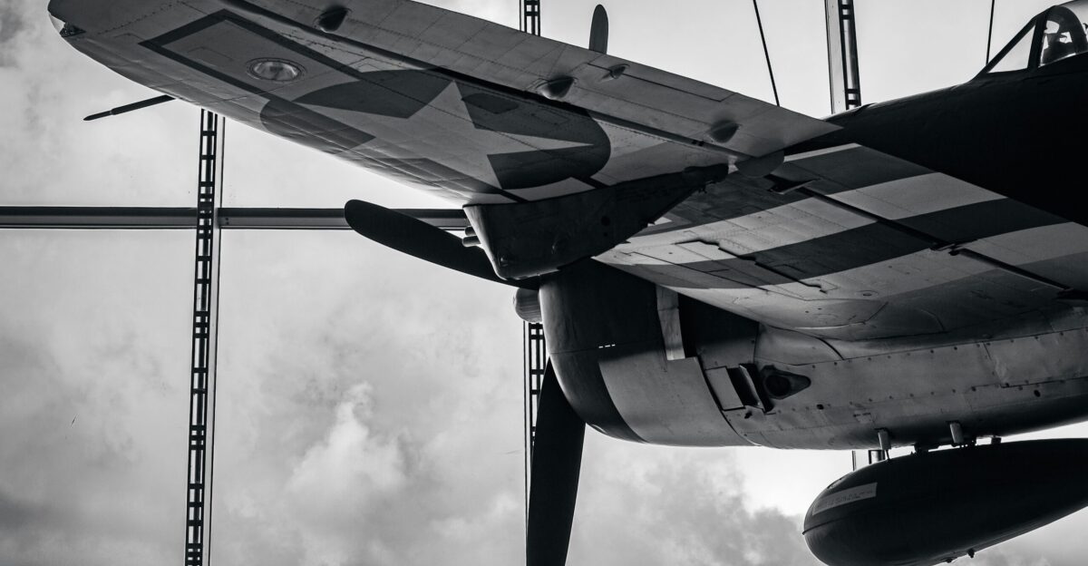 a black and white photo of an old airplane