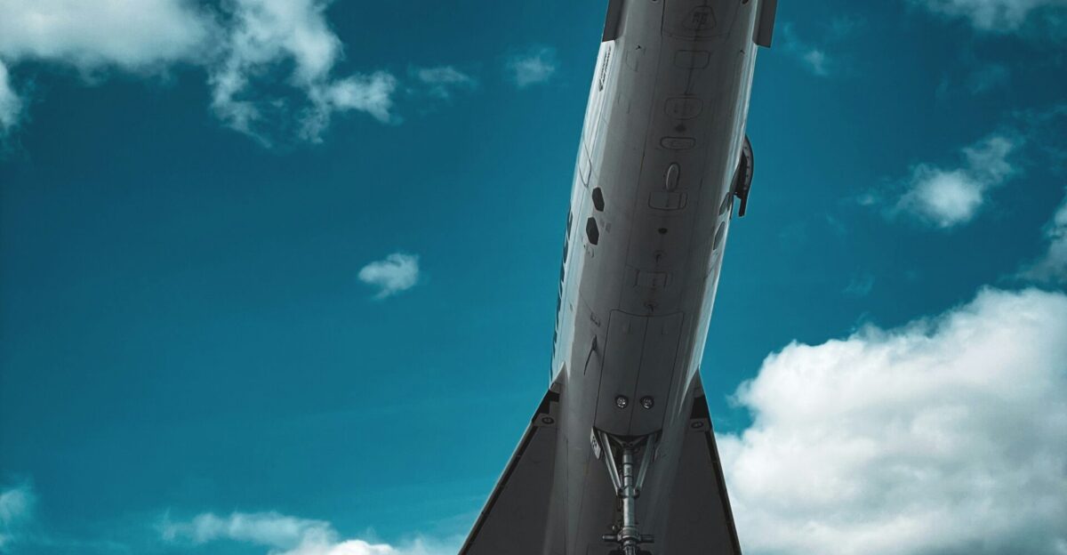 a large jetliner sitting on top of a runway