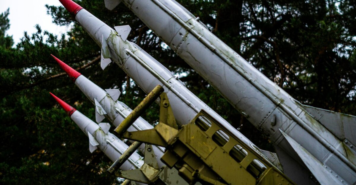 A group of missiles sitting on top of each other