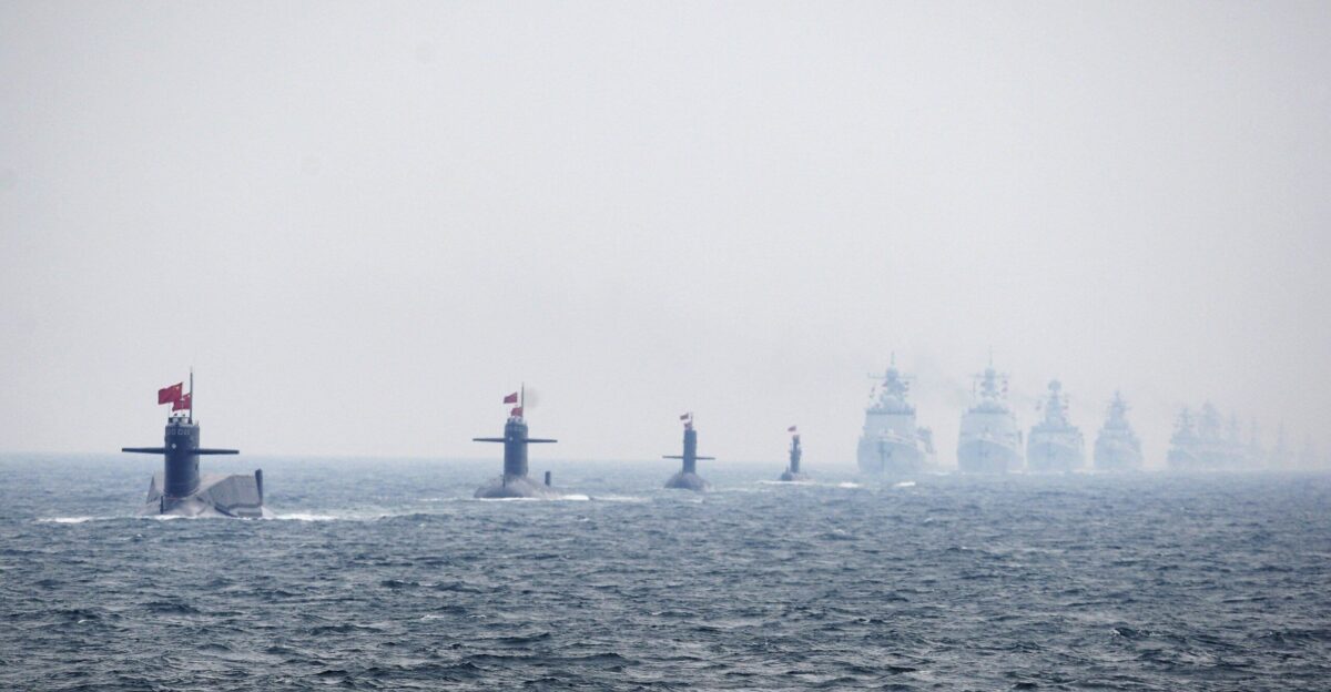 Chinese Navy submarines and warships take part in an international fleet review to celebrate the 60th anniversary of the founding of the People s Liberation Army Navy in Qingdao Shandong province on April 23 2009 by Denny Griffin