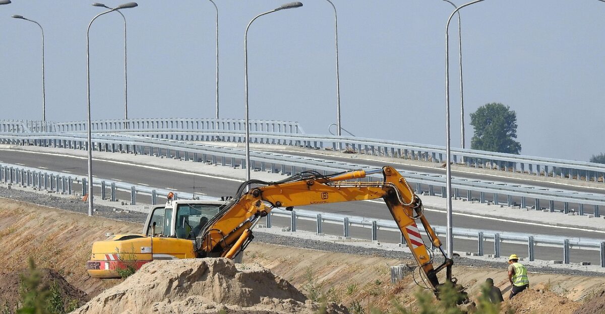 way building excavator viaduct road cities work digging builder a worker at the construction site construction site excavator excavator excavator excavator digging digging digging digging digging builder construction site