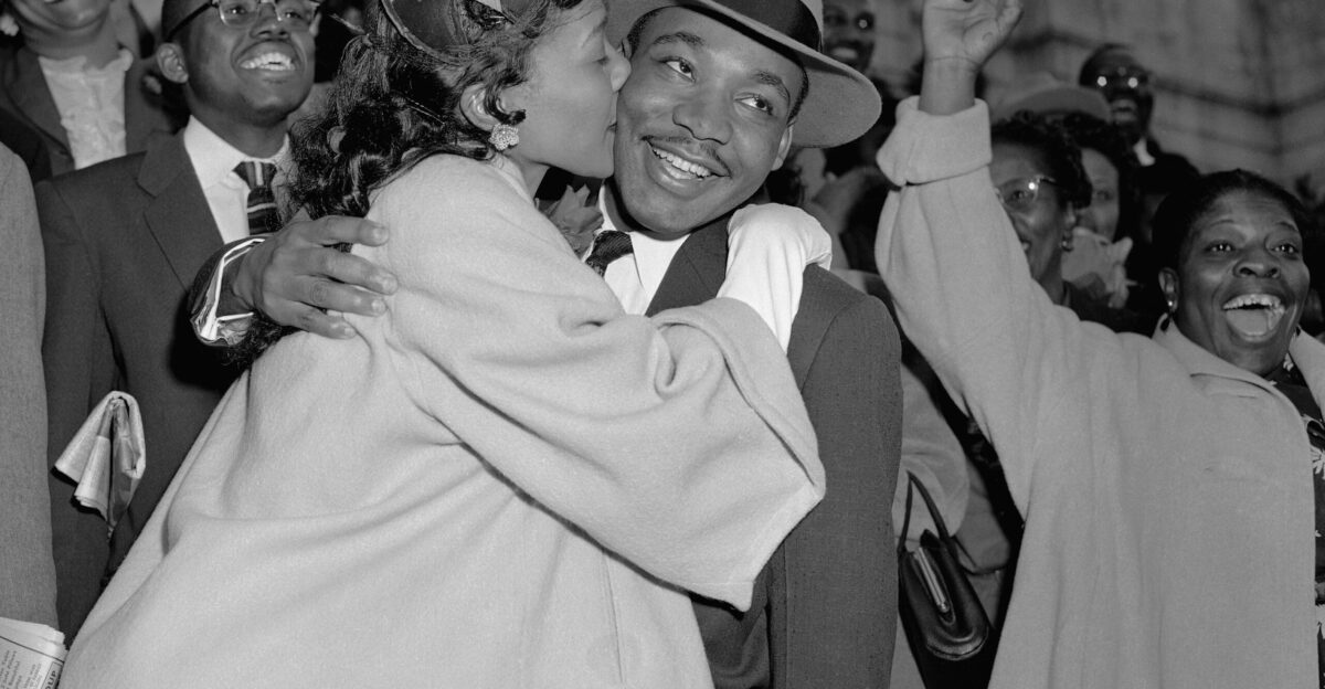 Martin Luther King Jr is welcomed with a kiss from his wife Coretta Scott King after leaving court in Montgomery AL on March 22 1956