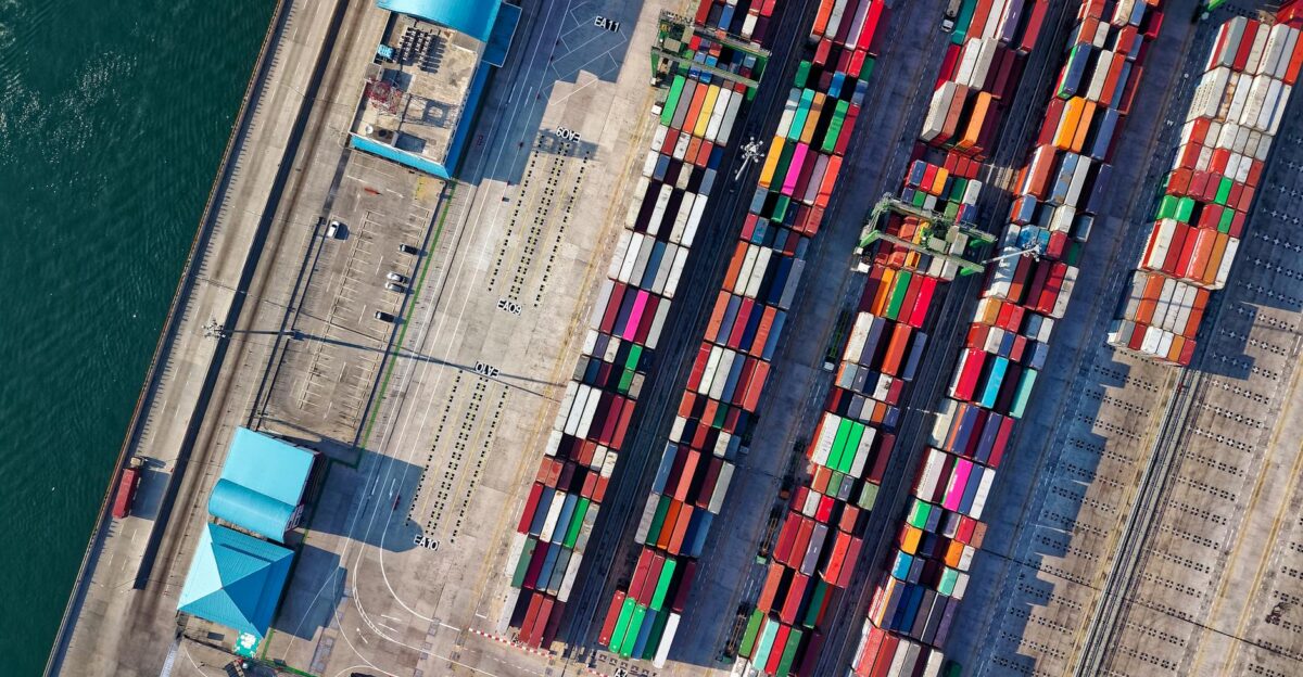 Top view of colorful shipping containers at a bustling port in Jakarta Indonesia