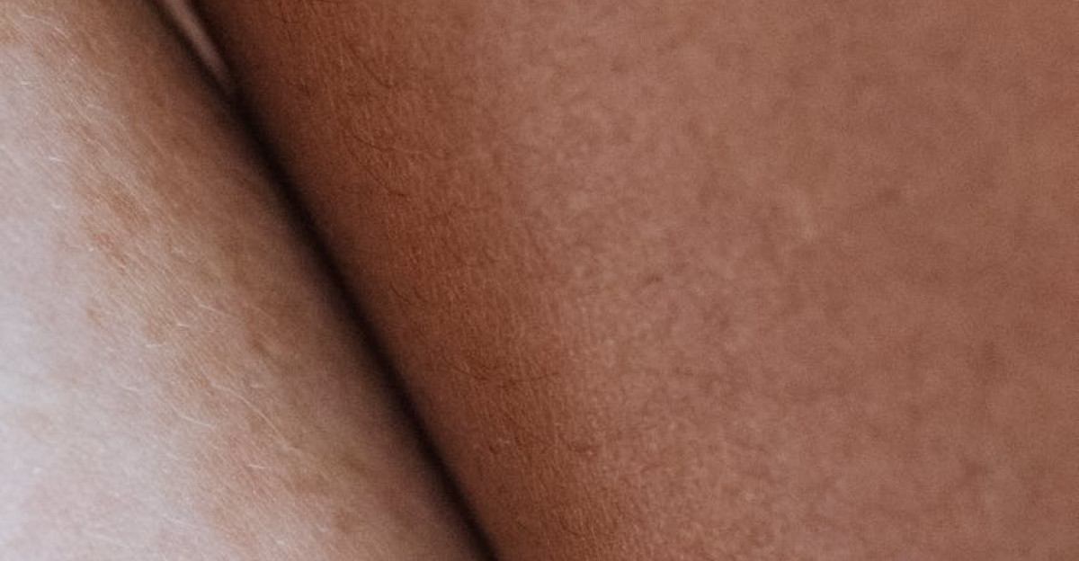 Detailed close-up showing the contrast between different skin tones and textures highlighting diversity
