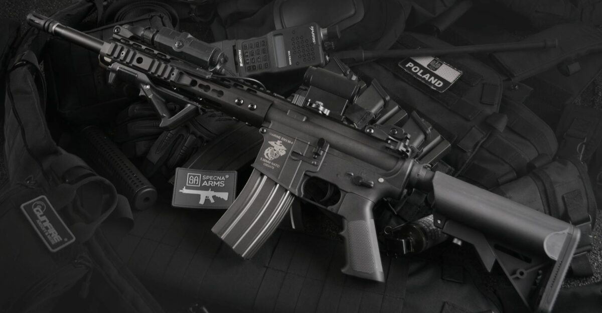 Detailed view of military rifles and tactical equipment showcasing precision