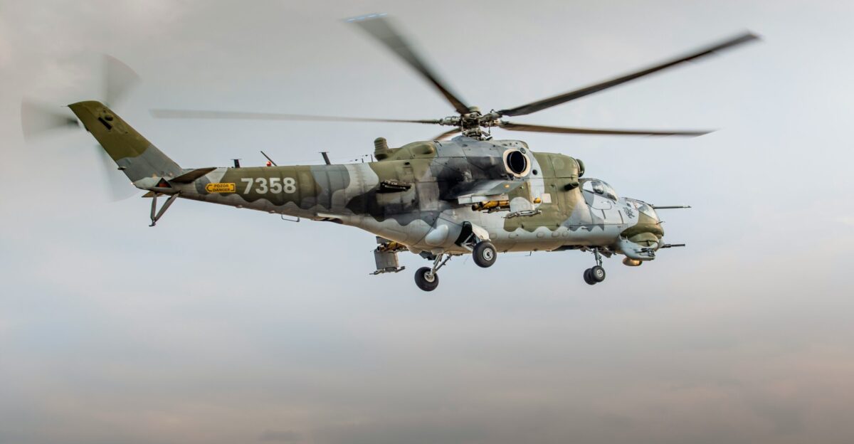 low angle photography of brown and gray helicopter