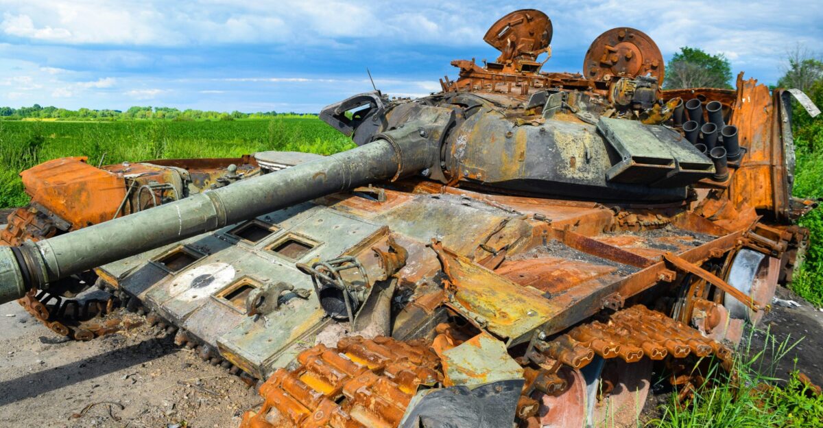 a tank with a pile of wood