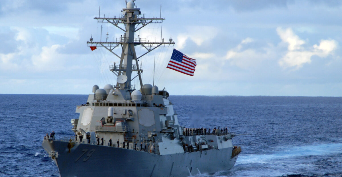 The guided-missile destroyer USS Oscar Austin DDG 79 prepares to perform a multi-ship maneuvering exercise with the Harry S Truman Strike Group The strike group is en route to the Central Command area of responsibility as part of the ongoing rotation to support maritime security operations in the region