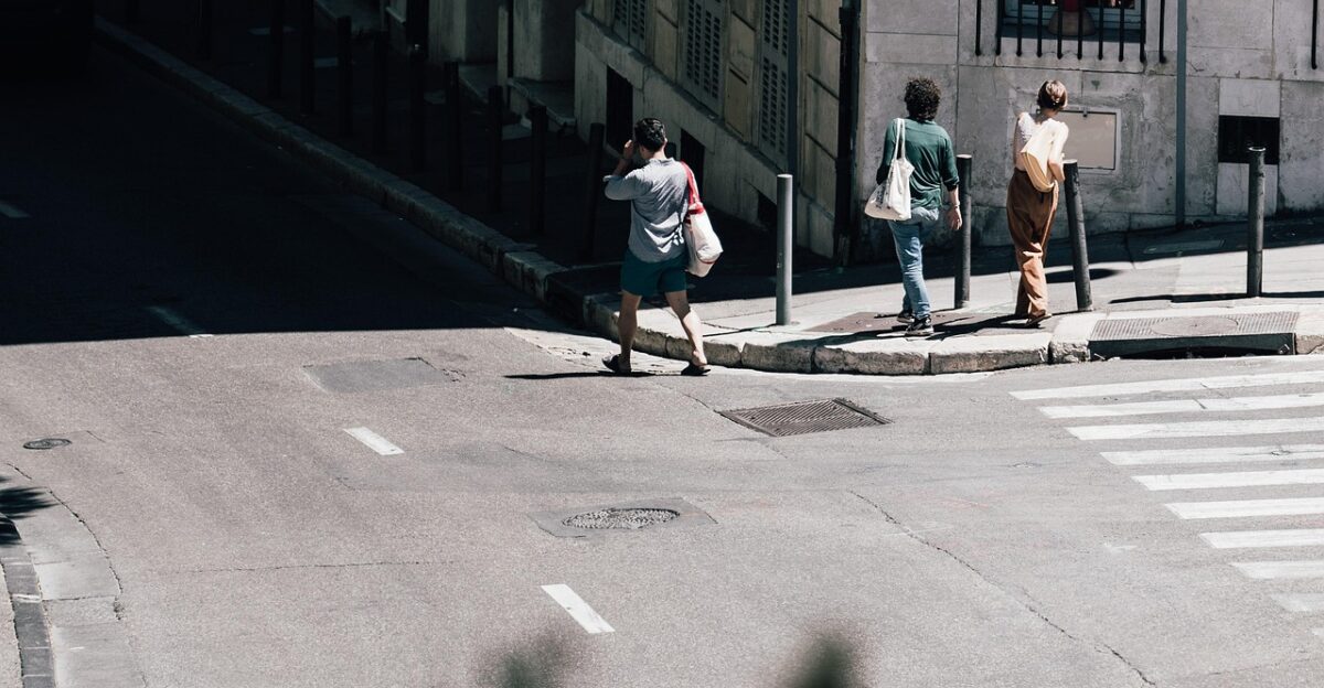pedestrian walking sidewalk pavement city crosswalk street road pedestrian walking walking sidewalk sidewalk sidewalk sidewalk sidewalk city crosswalk crosswalk street street street road road