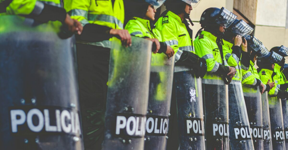 a row of police officers standing next to each other