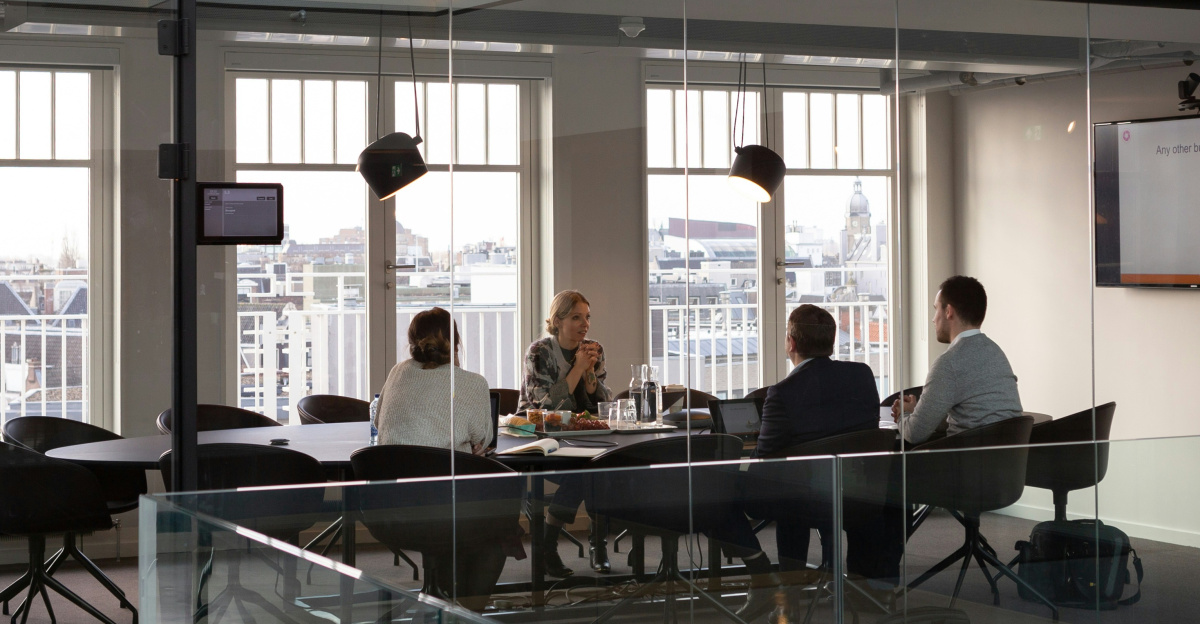 people sitting on chair inside building